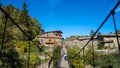 People crossing the suspension bridge of Rupit