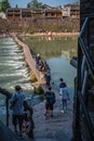 Wooden bridge path over Tuo Jiang river in Feng Huang Royalty Free Stock Photo