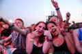 People from the crowd (fans) watch a concert at FIB Festival