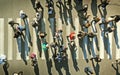 People crowd on a pedestrian crosswalk. Aerial.