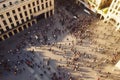 People crowd walking on around city square view from the top