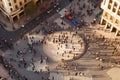 People crowd walking on around city square view from the top