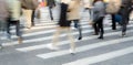 People crowd on zebra crossing