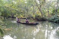 People cruising on a canoe a river of the backwaters Royalty Free Stock Photo