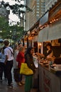 People Customers Ordering Food at New York City Street Fair Food Cart Eating Royalty Free Stock Photo