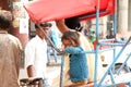 People and cycle rikshaws, streets of the suburb Old Delhi Royalty Free Stock Photo