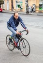 People cycling along the street