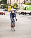 People cycling along the street