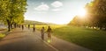 People cycling around Blonia meadow in Krakow, Poland