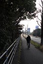 People cycling around Yamaguchi, Japan - during winter. Taken in