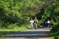 People cycling, Jogging and walking on the bikeway in the afternoon , Lexington, MA. USA. May 21, 2023