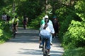 People cycling, Jogging and walking on the bikeway in the afternoon , Lexington, MA. USA. May 21, 2023