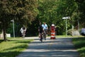 People cycling, Jogging and walking on the bikeway in the afternoon , Lexington, MA. USA. May 21, 2023