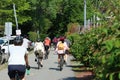 People cycling, Jogging and walking on the bikeway in the afternoon , Lexington, MA. USA. May 21, 2023