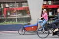 People cycling on the street in Amsterdam city