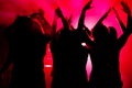 People dancing in club with lightshow Royalty Free Stock Photo