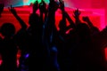 People dancing in club with lightshow Royalty Free Stock Photo