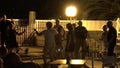 People dancing late at nigth in the public eria