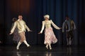 People dancing in traditional costumes on stage, Royalty Free Stock Photo