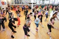 People dancing during Zumba training fitness at a gym