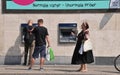 People at danske bank atm cashing money in Copenhagen
