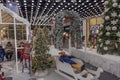 People in a decorated corner for Christmas activities for shoppers at GRANBY shopping center.