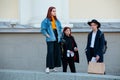 People demonstrating street style fashion near Moscow Manege at Mercedes-Benz Fashion Week Russia.