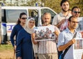 People denouncing the Syrian airstrikes on Douma