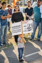 People denouncing the Syrian airstrikes on Douma