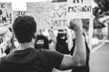 People from different ages and races protest on the street for equal rights - Concept of demonstrators on road for Black Lives Royalty Free Stock Photo