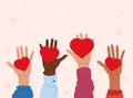 People of different races raised their hands together, heart in the palms, the concept of help