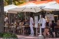 People dining on Ocean Drive Miami Beach. Shot with a telephoto lens