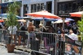 People dining outdoors on Fifth Ave in San Diego, CA