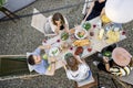 People dining outdoors, view on table from above Royalty Free Stock Photo