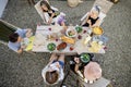 People dining outdoors, view on table from above Royalty Free Stock Photo