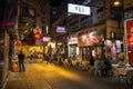 People dining on the street in Hong Kong at night Royalty Free Stock Photo