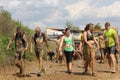 People dirt with mud during a Mud Run competition