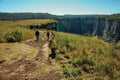 People on dirt pathway at the Itaimbezinho Canyon