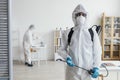 people disinfecting together dangerous area. High quality photo