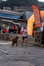 People and dogs in the amateur race in Encamp. Canicross in Andorra