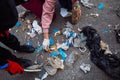 People doing a beach clean-up, community initiative to gather trash