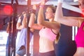 People doing chin ups exercise in gym Royalty Free Stock Photo