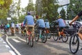 People doing cycling sports on Sundays during car free day on Dago street, Bandung city, Indonesia to maintain healthy lifestyle