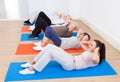 People Doing Sit Ups At Gym Royalty Free Stock Photo