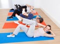 People doing sit ups at gym Royalty Free Stock Photo