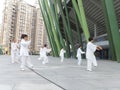 Shenzhen, China: people do tai chi exercises in the morning Royalty Free Stock Photo