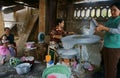 People doing traditional Vietnamese food