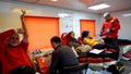 People donate blood to the Red Crescent blood bank in order to help the injured people in the earthquake area in Turkey