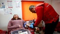 People donate blood to the Red Crescent blood bank in order to help the injured people in the earthquake area in Turkey