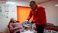 People donate blood to the Red Crescent blood bank in order to help the injured people in the earthquake area in Turkey